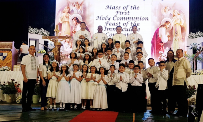 SLU Elementary pupils receive First Holy Communion SLU Elementary