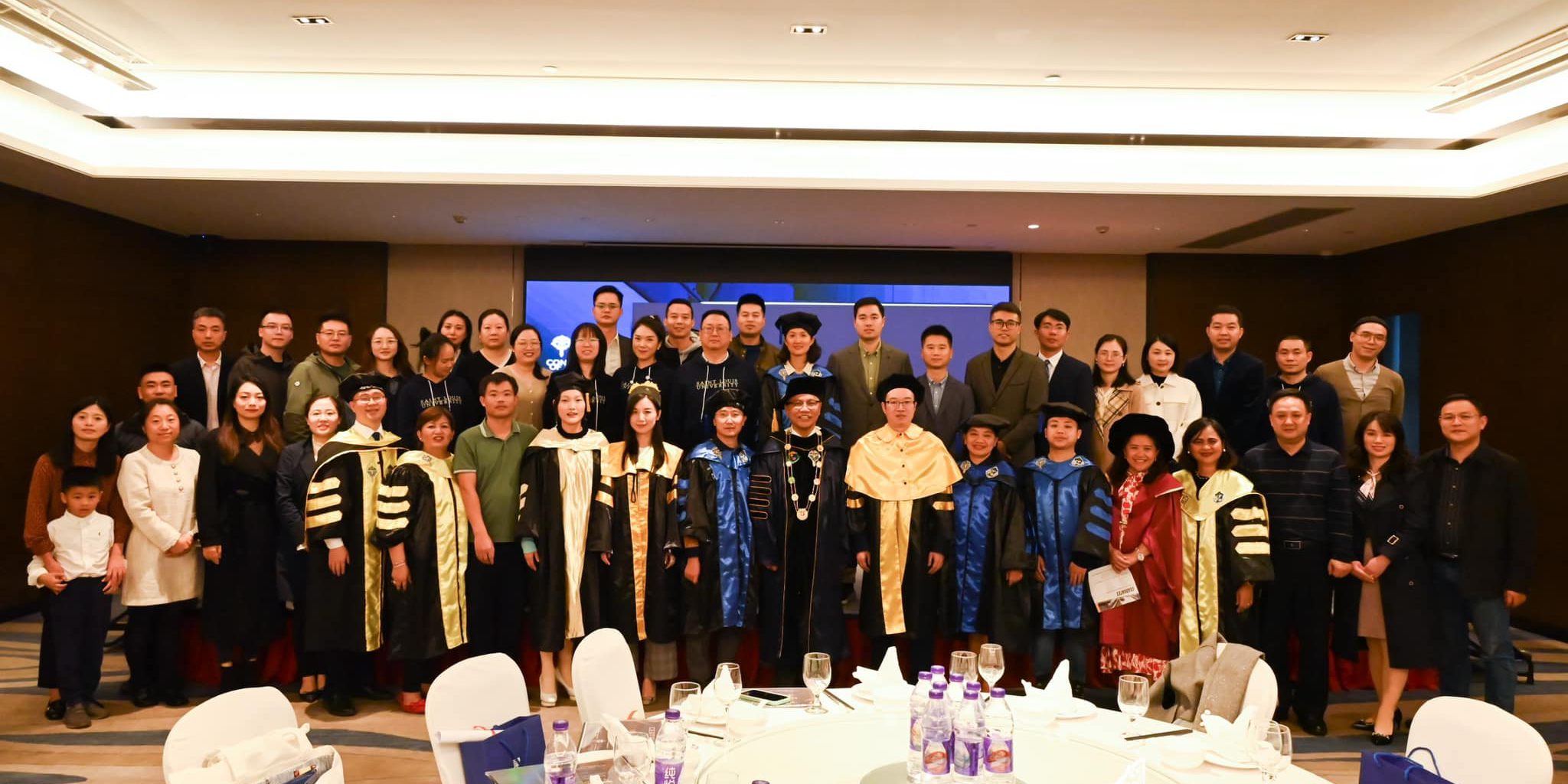 The SLU Graduates and Students from China with SLU Administrators