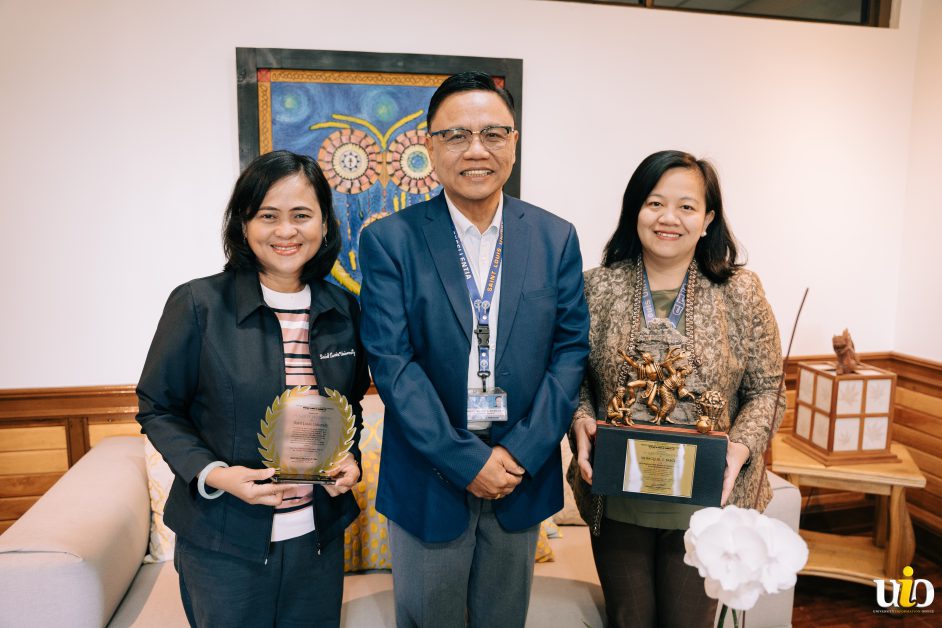 In the photo, Dr. Richel La Madrid (Left) and Dr. Barcelo (Right) presented the awards to SLU President Fr. Gilbert Sales (Middle).
